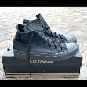 Black high-top Chucks